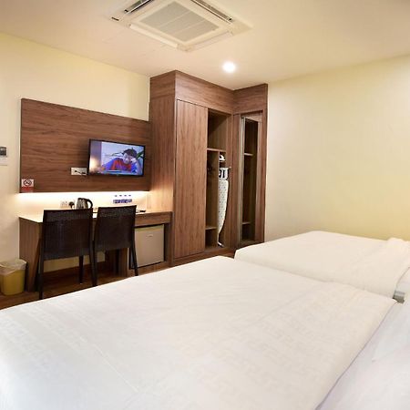 Yangtze Hotel 长江酒店 Τζόχορ Μπάχρου Δωμάτιο φωτογραφία